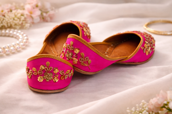 Fuchsia Floral Embellished Juttis with Golden Trim