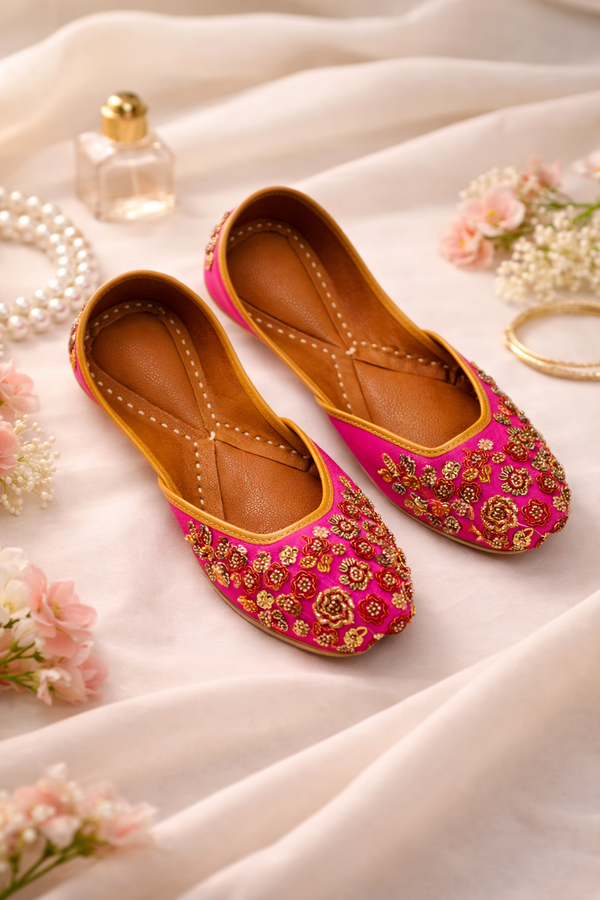 Fuchsia Floral Embellished Juttis with Golden Trim